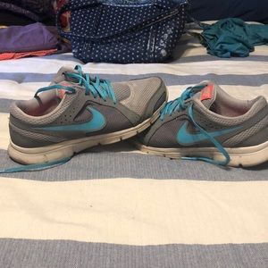Gray and blue w pink nike shoes